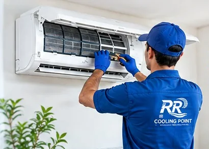 RR Cooling Point technician servicing an AC